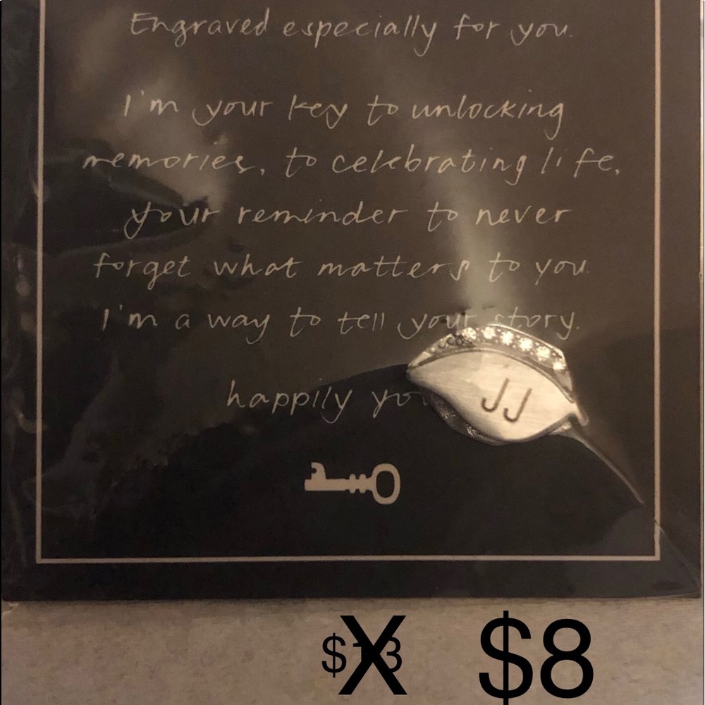 KEEP Collective sliver engraved leaf.